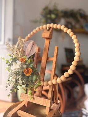 Neutral Wood Bead Wreath with Faux Dried Flower Accent